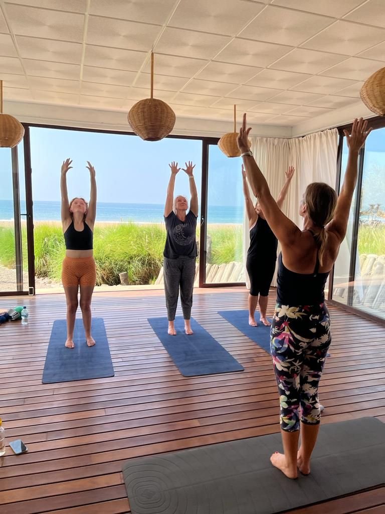 Ros Cox Wellness hosting pilates class by the sea